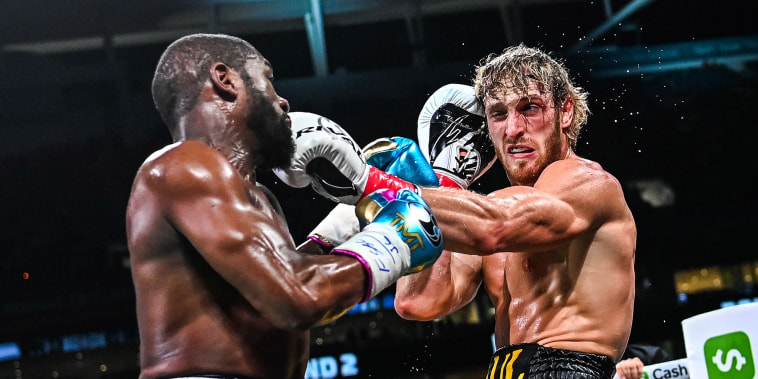 Image: Former world welterweight king Floyd Mayweather and YouTube personality Logan Paul fight in an eight-round exhibition bout at Hard Rock Stadium in Miami