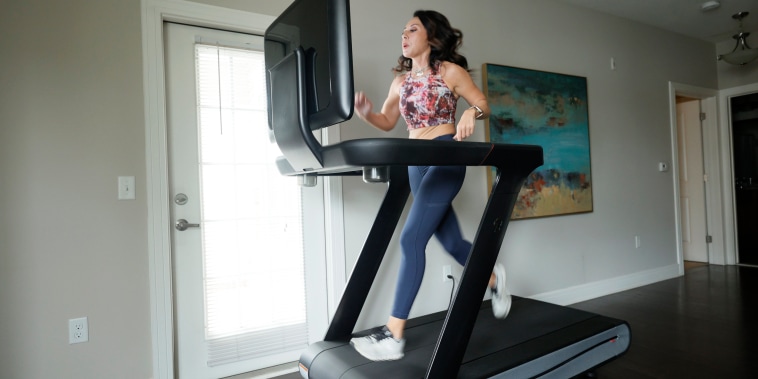 Liza Lecher works out on her Peloton Tread+ treadmill on May 24, 2021, in Williamstown, N.J.