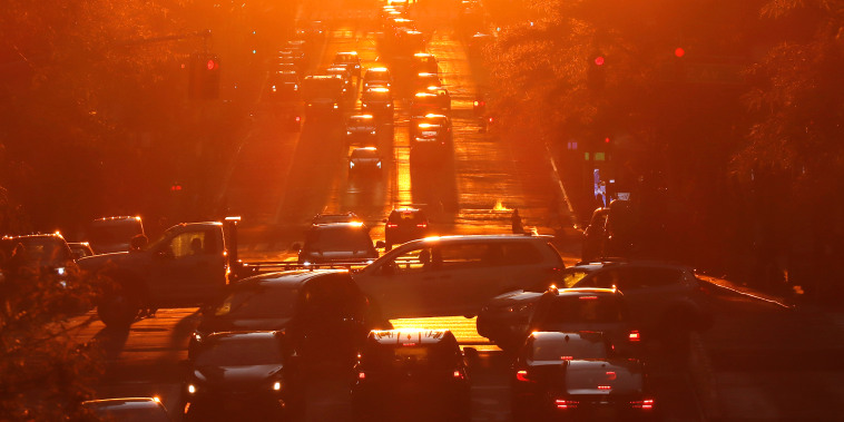 Image: Traffic crosses 42nd Street as the sun sets on June 4, 2021 in New York City.
