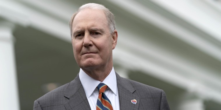 Image: Gary Kelly, chief executive officer of Southwest Airlines Co., listens during a news conference outside the White House