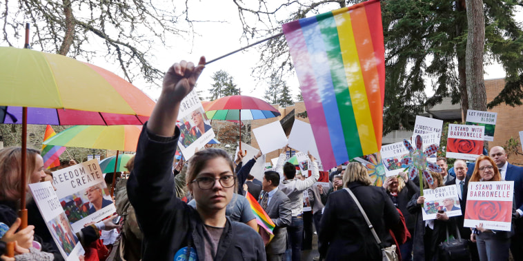 Image: Supporters on both sides of the case line a walkway following a hearing before Washington's Supreme Court about a florist, Barronelle Stutzman, who was sued for refusing to provide services for a same sex-wedding on Nov. 15, 2016, in Bellevue, Wash