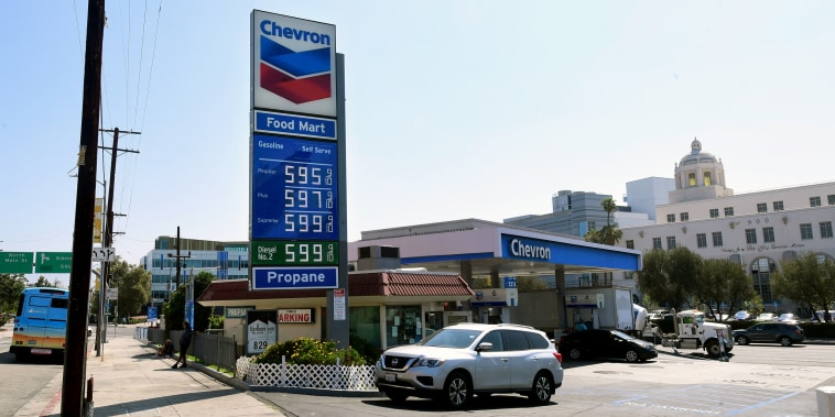 Some of the highest gas prices in town are posted on a signboard at a gas station in downtown Los Angeles on June 22, 2021, as gasoline prices rise.
