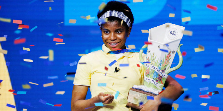 Zaila Avant-garde, 14, from New Orleans, holds the trophy after winning the 2021 Scripps National Spelling Bee Finals in Lake Buena Vista, Fla., on July 8, 2021.