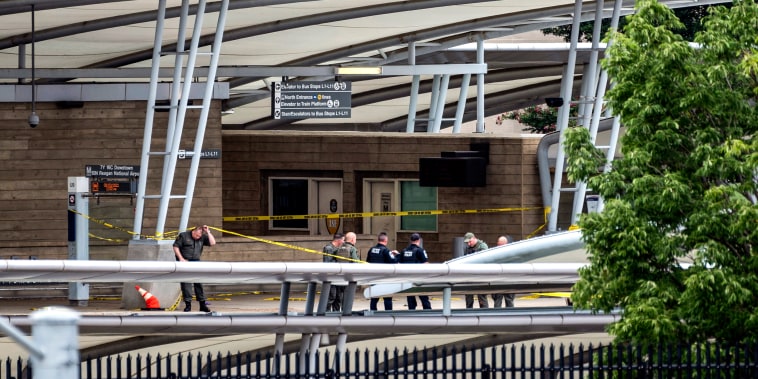 Image: A police officer passes underneath barrier tape outside the Pentagon Metro area on Aug. 3, 2021, at the Pentagon in Washington.