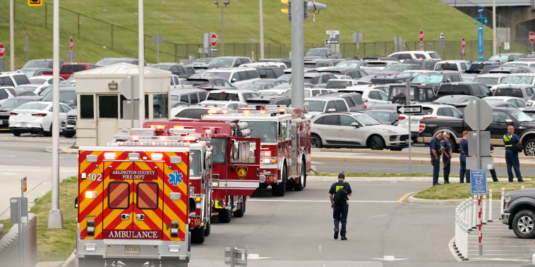 Image: Rescue vehicles outside the Pentagon Metro area in Washington on Aug. 3, 2021 after multiple gunshots were fired near a platform by the facility's Metro station.