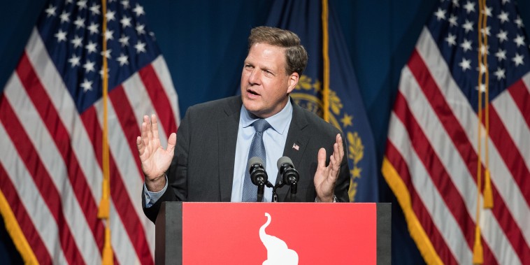 Image: New Hampshire Governor Chris Sununu introduces Vice President Mike Pence during the GOP Lincoln-Reagan Dinner