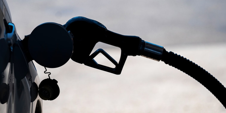 A driver fills up the tank at a Chevron gas station in Sacramento, Calif., on July 7, 2021.