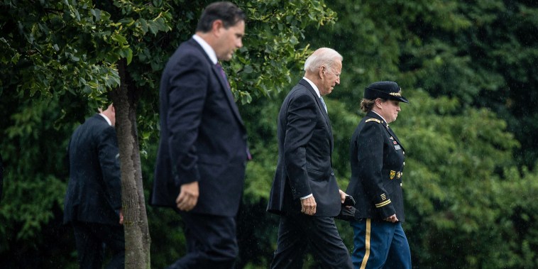 Image: President Joe Biden walks to Marine One at Fort McNair after returning to the White House on Aug. 16, 2021.