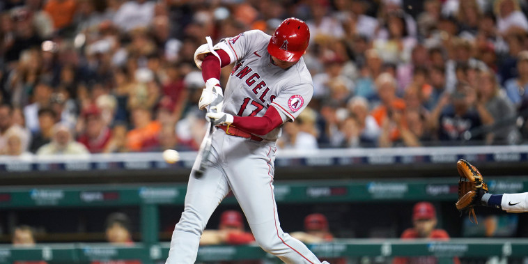Los Angeles Angels' Shohei Ohtani hits a solo home run against the Detroit Tigers in the eighth inning of a baseball game in Detroit on Aug. 18, 2021.