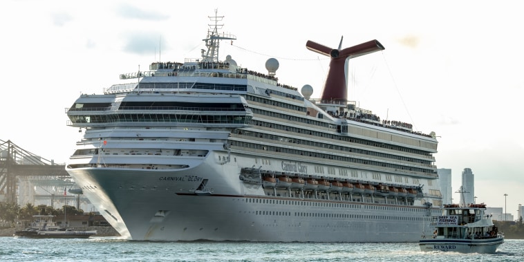 Carnival's Glory cruise ship stands docked prior to departure at the Port of Miami in Miami on March 9, 2014.