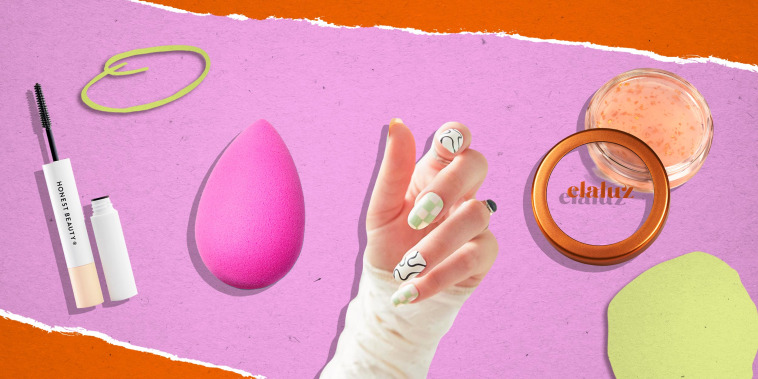 Illustration of a BeautyBlender, Elaluz 24K Lip Therapy, hand with Chillhouse Chill Tips Press-On Manicure Kit and Honest Beauty 2-in-1 Extreme Length Mascara + Lash Primer