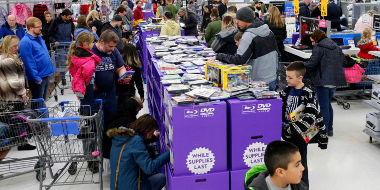 Shoppers look for deals at Walmart in Idaho Falls, Idaho, on Black Friday, Nov. 23, 2018.