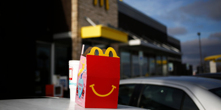 A Happy Meal box sits on top of a customer's vehicle outside a McDonald location in White House, Tenn., on Jan. 18, 2017.