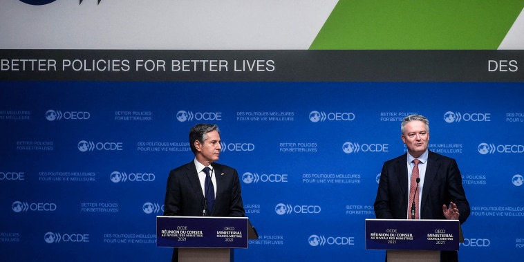 Image: Secretary-General of the Organization for Economic Cooperation and Development (OECD) Mathias Cormann, right, and U.S. Secretary of State Anthony Blinken hold a closing press conference at the 60th OECD Ministerial Council Meeting on Oct. 6, 2021,