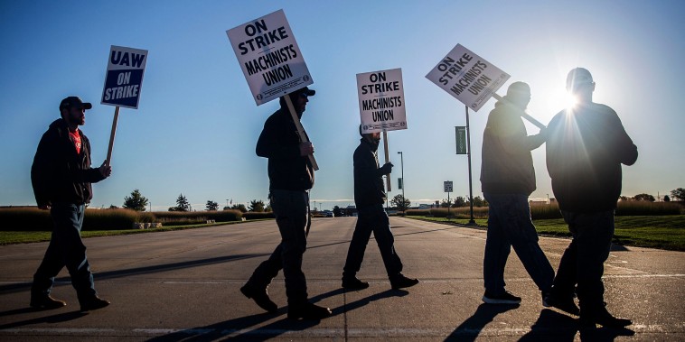 United Auto Workers picket outside of John Deere Des Moines Works on Oct. 14, 2021, in Ankeny, Iowa.