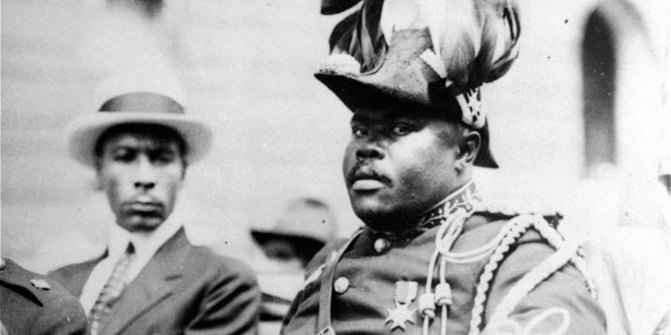 Marcus Garvey in a military uniform as the \"Provisional President of Africa\" during a parade on the opening day of the annual Convention of the Negro Peoples of the World along Lenox Avenue in Harlem, N.Y., August 1922.
