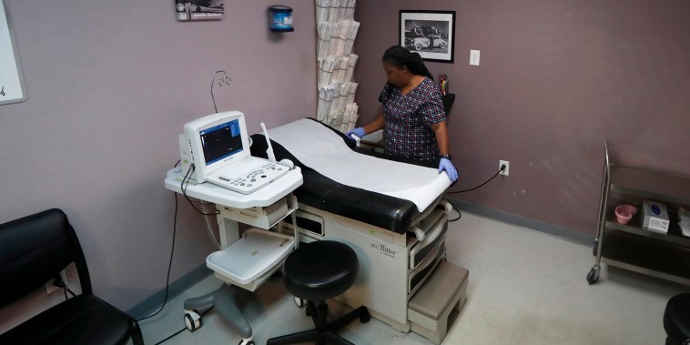 Director of Clinical Services Marva Sadler, prepares the operating room at the Whole Woman's Health clinic in Fort Worth, Texas, on Sept. 4, 2019.