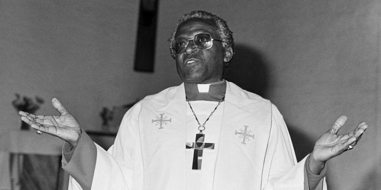 In this file photo taken on June 23, 1985 South African activist and Nobel Peace Prize and Anglican Archbishop Desmond Tutu delivers a sermon, at the Regina Mundi Church, in Soweto, protesting against the South African raid into Botswana. - South African