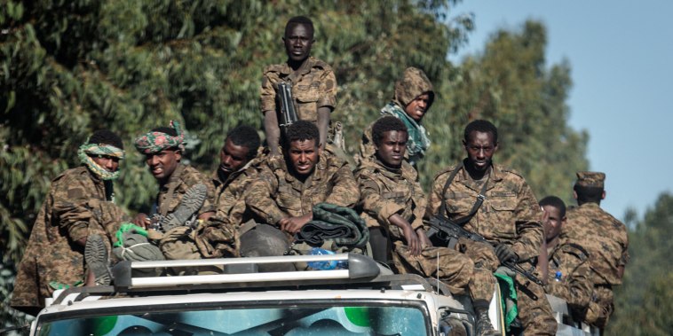 Image: Soldiers of the Ethiopian National Defense Force (ENDF) ride on a truck in Gashena, Ethiopia, on Dec. 6, 2021.