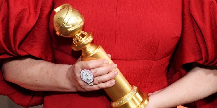 Image: An actor holds her statue at the Golden Globe Awards in Beverly Hills, Calif., on Jan. 5, 2020.