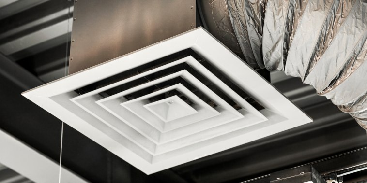 An air duct hanging from a ceiling, close-up, low angle view