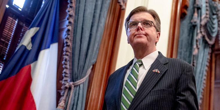 Texas Lt. Gov. Dan Patrick exits a press conference at the state Capitol in Austin on March 31, 2020.