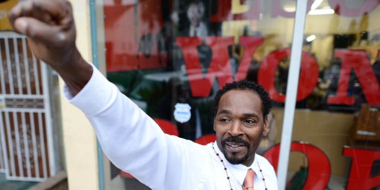 Rodney King gestures prior to the presentation of his autobiographical book \"The Riot Within...My Journey from Rebellion to Redemption,\" in Los Angeles on April 30, 2012.