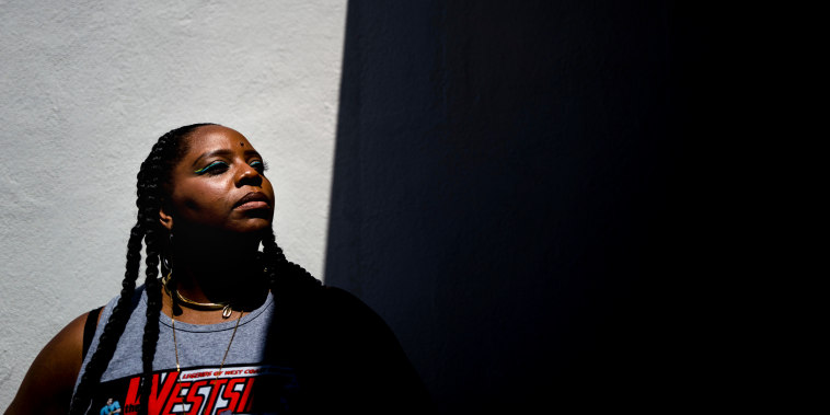 Black Lives Matter co-founder Patrisse Cullors stands for a photo at Crenshaw Dairy Mart, an art gallery and studio space co-founded by Cullors, in Inglewood, Calif., on April 19, 2022.