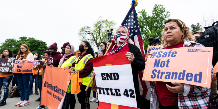 Immigration activists demonstrate in front of the Supreme Court on April 26, 2022.