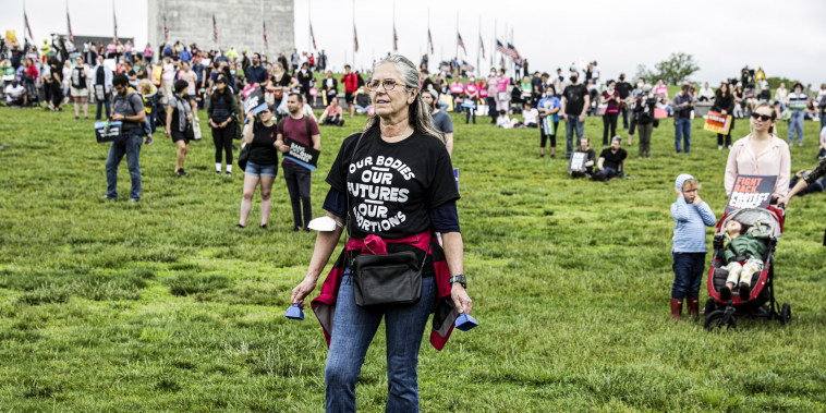 Abortion rights demonstrators and advocates attend the \"Bans Off Our Bodies\" rally on the National Mall in Washington on May 14, 2022.