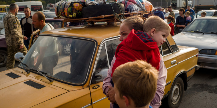 Image: Victoria and her children, Gleb and Arseni, left their home in Berdyansk, Ukraine, in fear of the annexation referendum on Sept. 28, 2022.
