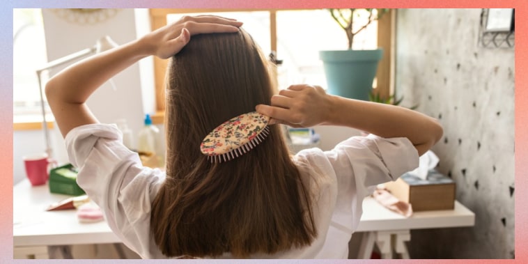Women brushing her hair