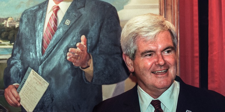 Former House Speaker Newt Gingrich (R-GA) smiles d