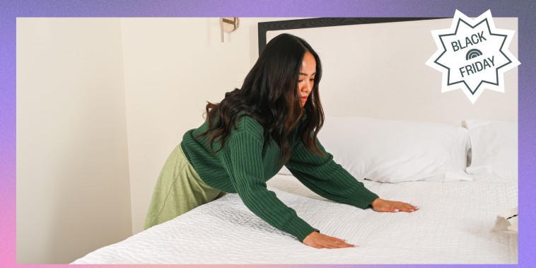 Woman making her bed