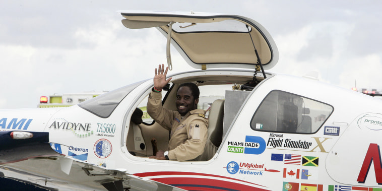 Solo pilot Barrington Irving receives an honorary welcome after landing at Opa-Locka Airport in Miami on June 27, 2007.