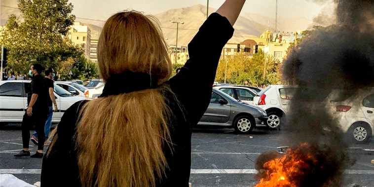 Iranians protests the death of 22-year-old Mahsa Amini in Tehran, on Oct. 1, 2022.