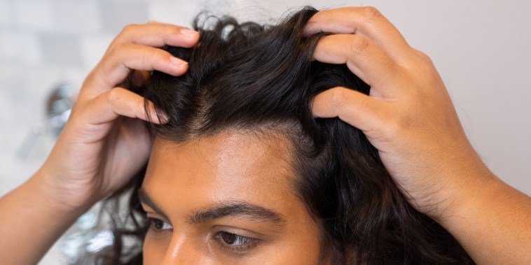 Close-up of a Woman touching her hair