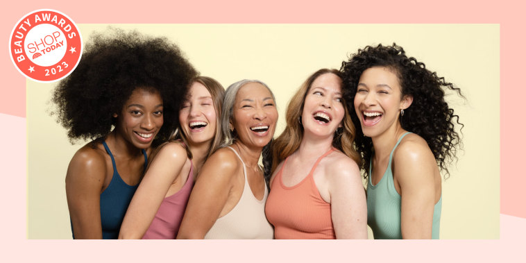 Group of women smiling and hugging