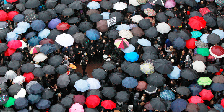 A sea of umbrellas of women and men participating in a nationwide "Black Monday" strike to protest a legislative proposal for a total ban on abortion, in downtown Castle Square is pictured in Warsaw, Poland, Monday, Oct. 3, 2016. Massive protests were hel