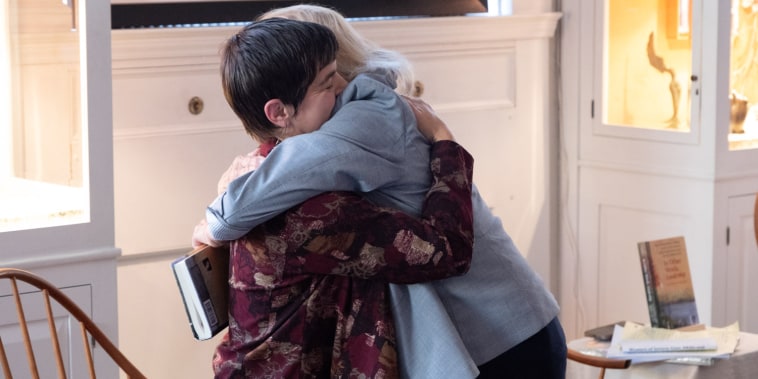 Ashirah Knapp, left, hugs Maine Gov. Janet Mills, who became her pen pal in 2020.