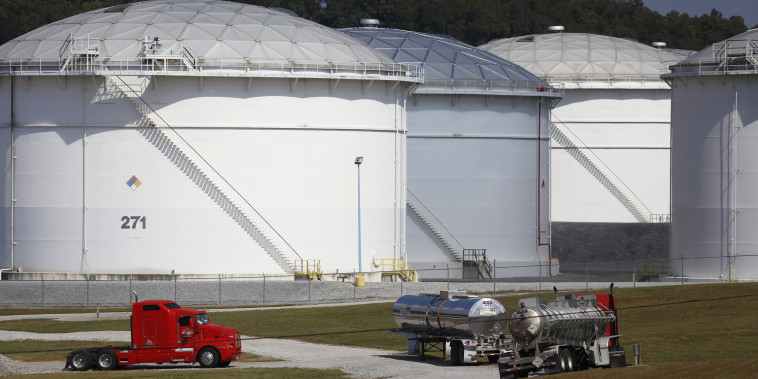 Tanker trucks are parked at the Colonial Pipeline Co. Pelham junction and tank farm in Pelham, Ala., on Sept. 19, 2016.