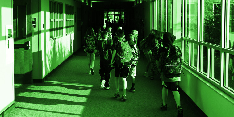 Students head to class at West Ridge Elementary, in the 27J School District, on Aug. 12, 2021 in Thornton, Colo.