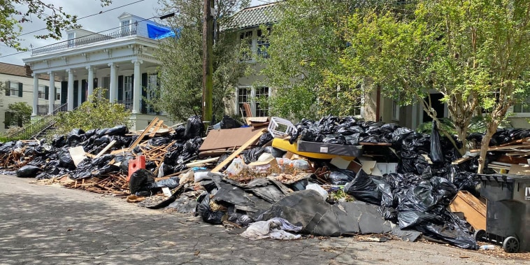 Image: Trash piled up on Bordeaux between St Charles and Pitt in New Orleans on Sept.16, 2021.