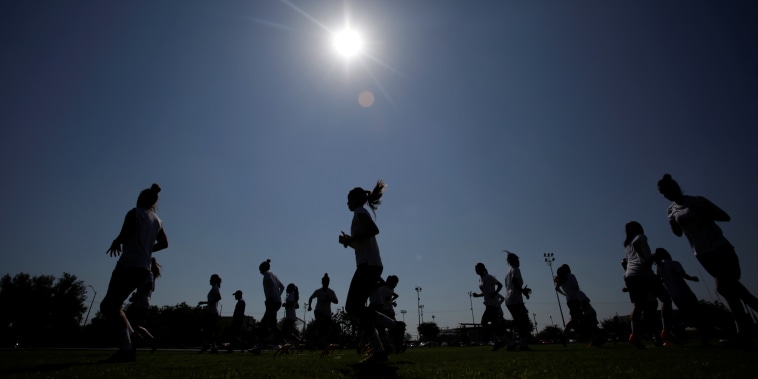 Image: Female soccer players take part in a training session