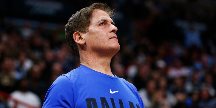 Mark Cuban watches his team, the Dallas Mavericks, play against the Miami Heat during the second half on Feb. 28, 2020, in Miami.