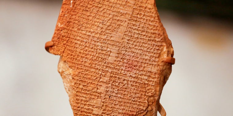Image: The Gilgamesh Dream Tablet, stolen from Iraq in 1991, returned to Iraq after it was seized by the U.S. government, is displayed at the Ministry of Foreign Affairs in Baghdad