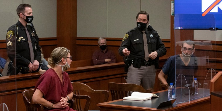 James and Jennifer Crumbley appear in court Dec. 14, 2021, in Rochester Hills, Michigan, in the case of the deadly Oxford High School shooting.