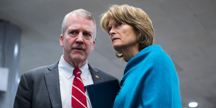 Image: Sens. Dan Sullivan, R-Alaska, and Lisa Murkowski, R-Alaska, stand together in the Capitol on Feb. 14, 2019.