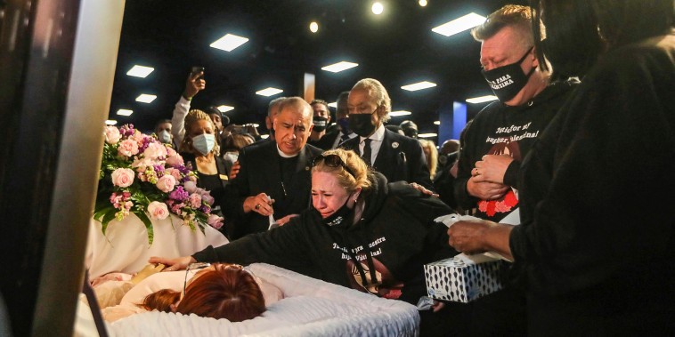 Image: The Rev. Al Sharpton and mother Soledad Peralta grieve at the funeral for 14-year-old Valentina Orellana-Peralta at the City of Refuge Church in Gardena, Calif., on Jan. 10, 2022.