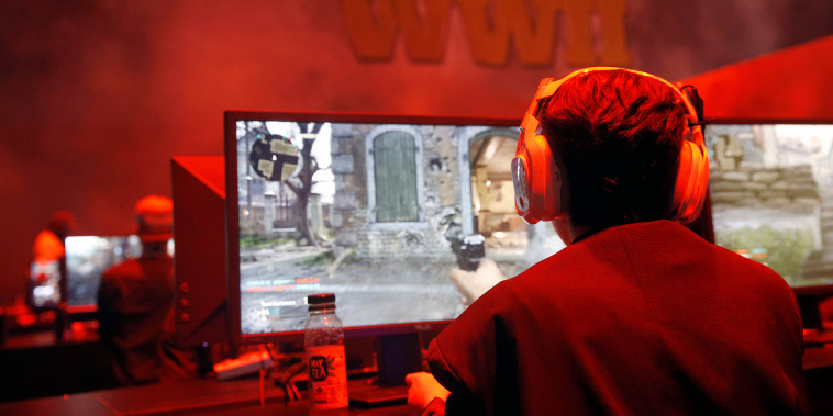 Gamers play the "Call of Duty WWII" developed by Sledgehammer Games and published by Activision during the "Paris Games Week" in 2017.